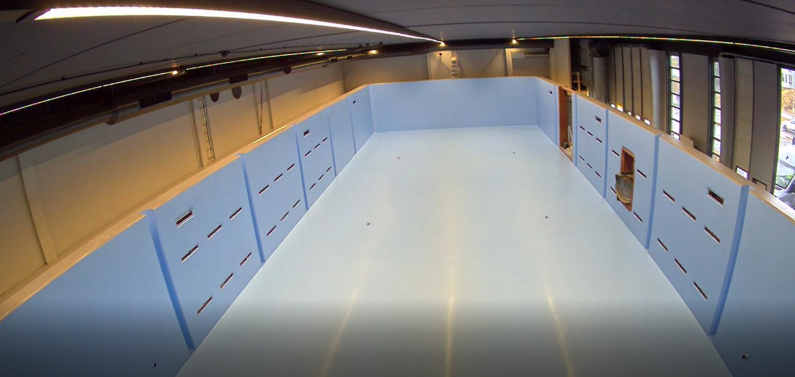 Coating being applied to the basin walls